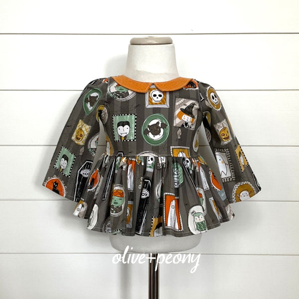 Spooky Portrait Peplum Top